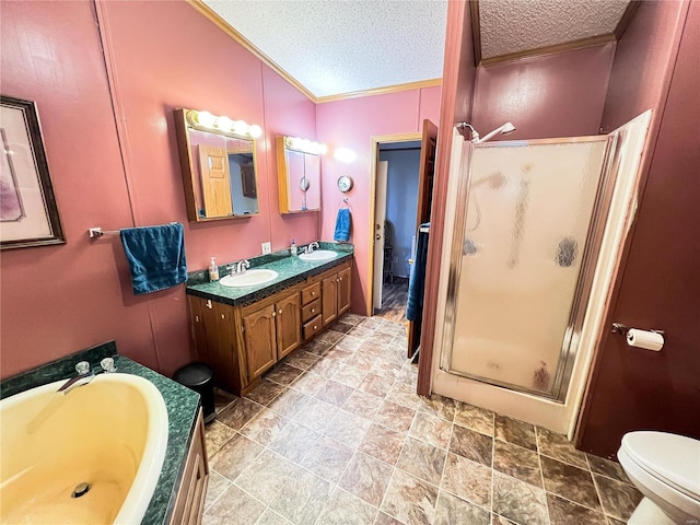 full bathroom featuring toilet, separate shower and tub, vanity, and a textured ceiling