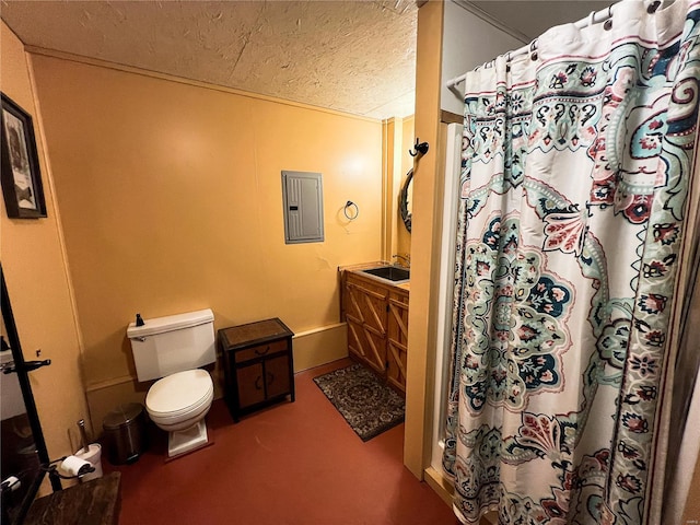 bathroom with electric panel, toilet, curtained shower, vanity, and a textured ceiling