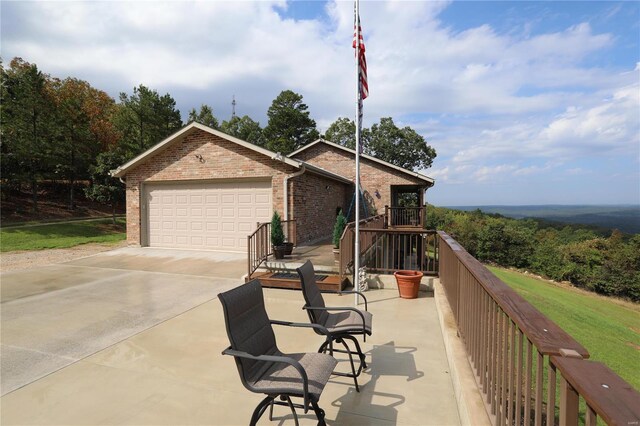 exterior space featuring a front yard and a garage