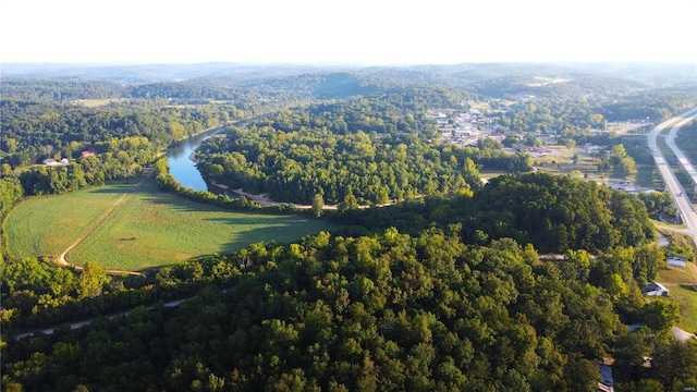 bird's eye view featuring a water view and a rural view