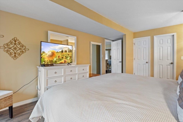 bedroom featuring wood-type flooring