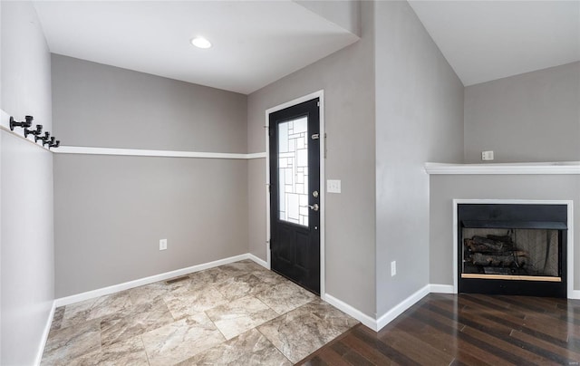 foyer entrance with hardwood / wood-style flooring