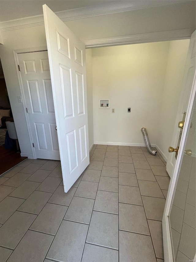 washroom with ornamental molding, light tile patterned floors, washer hookup, and electric dryer hookup