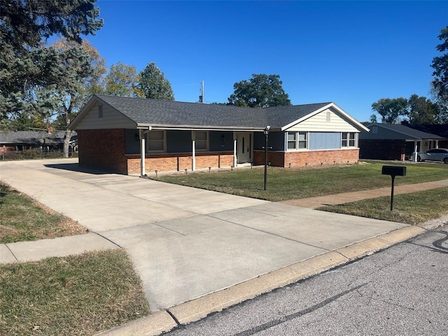 ranch-style house with a front lawn and a carport