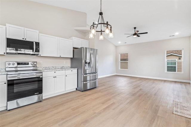 kitchen with white cabinetry, light wood-type flooring, and appliances with stainless steel finishes