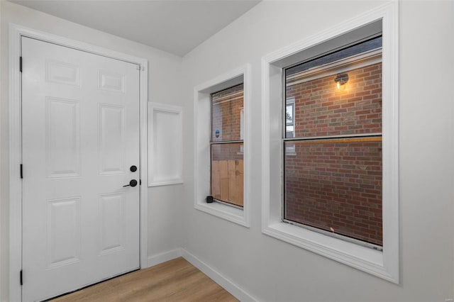 doorway to outside featuring light hardwood / wood-style flooring