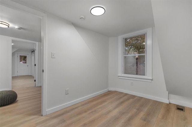 unfurnished room with light hardwood / wood-style flooring