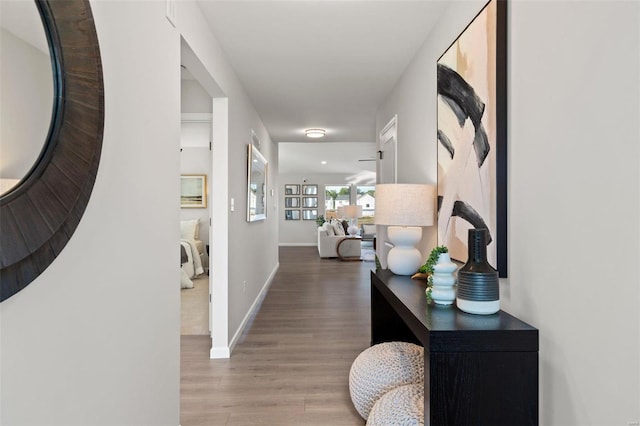 hallway featuring hardwood / wood-style floors