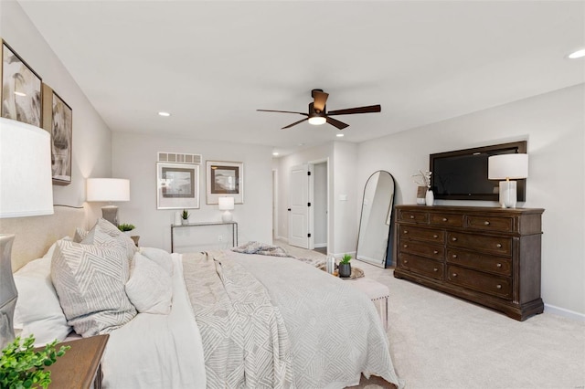 carpeted bedroom featuring ceiling fan