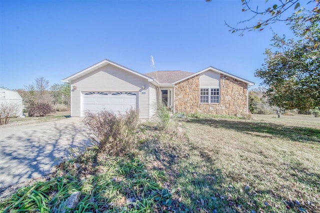 single story home with a front yard and a garage