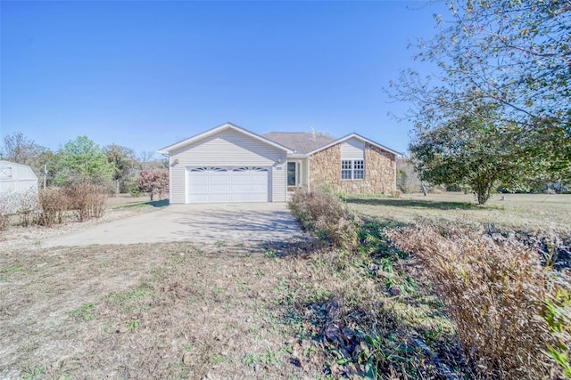 single story home featuring a garage