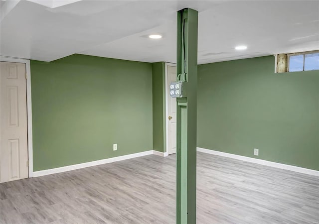 basement featuring light hardwood / wood-style flooring