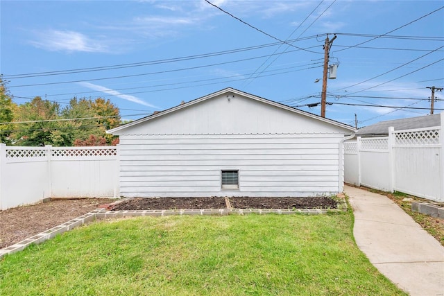 view of home's exterior featuring a yard