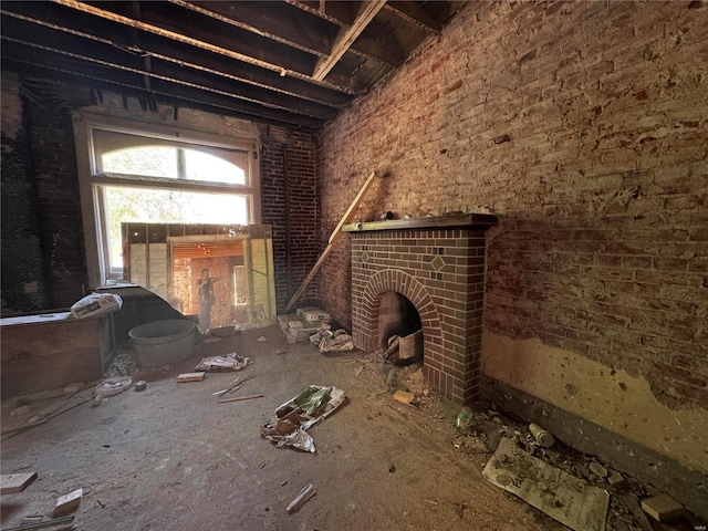 misc room featuring a brick fireplace