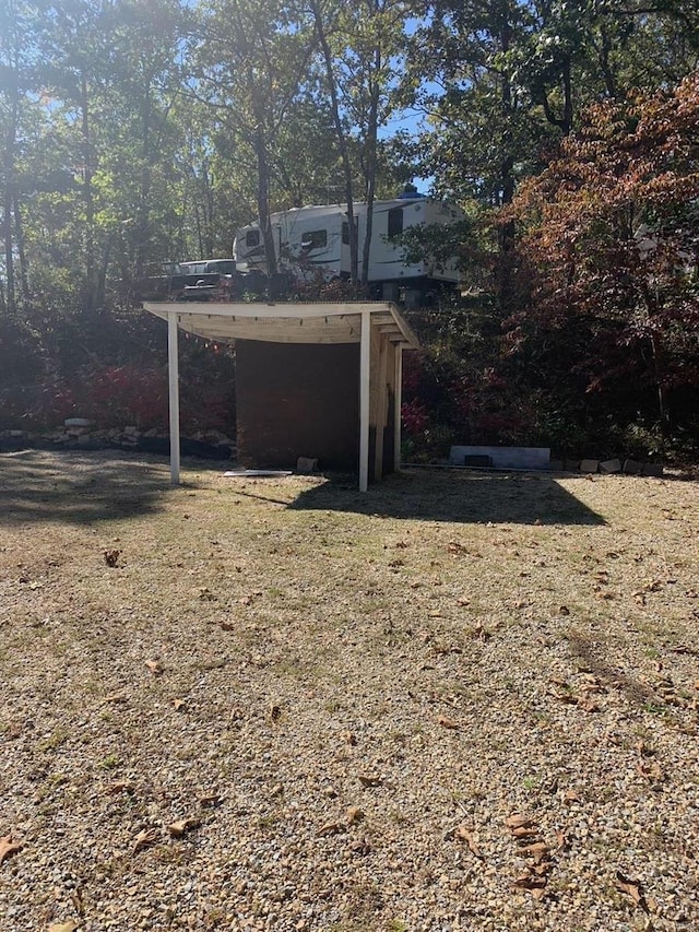 view of outdoor structure with a yard