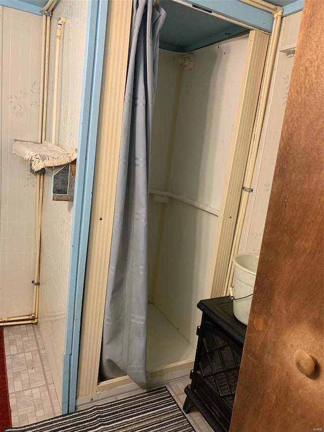 bathroom featuring walk in shower