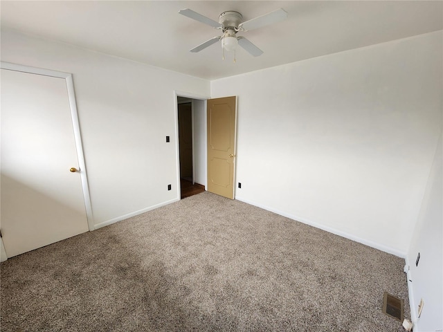 unfurnished bedroom with carpet flooring and ceiling fan