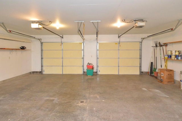 garage featuring a garage door opener