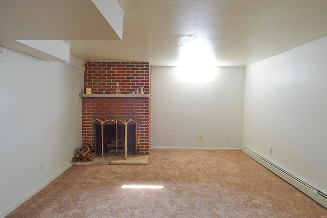 basement with a fireplace, a baseboard heating unit, and carpet flooring