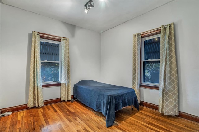 bedroom featuring hardwood / wood-style floors