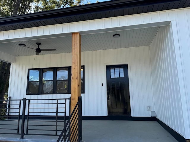 doorway to property with ceiling fan and covered porch