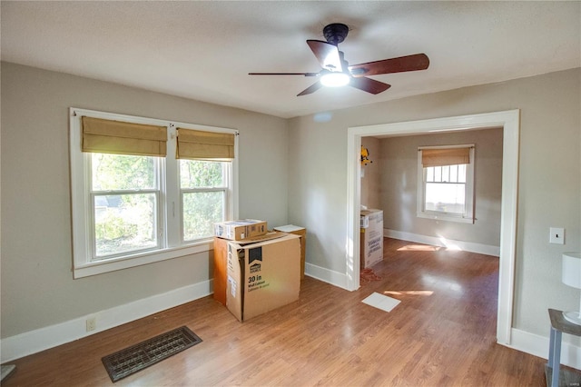 interior space featuring light wood-type flooring and ceiling fan