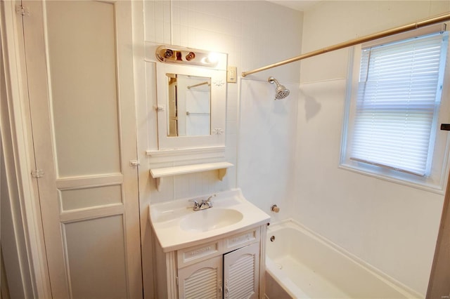 bathroom with bathing tub / shower combination and vanity