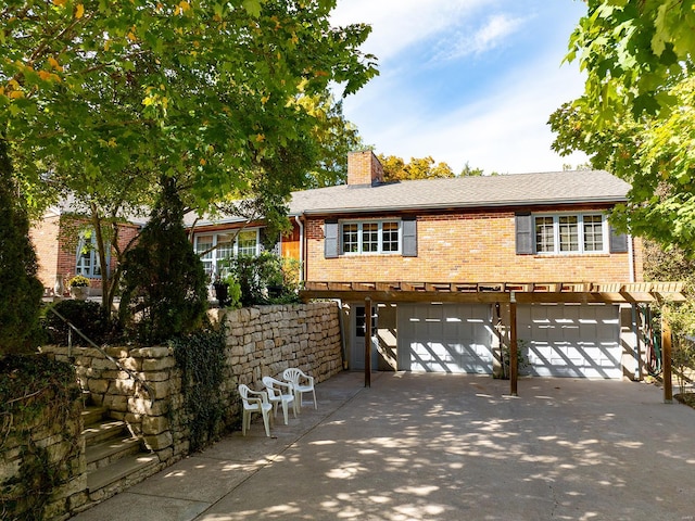 view of front of property featuring a garage