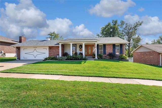 ranch-style home featuring a front yard, a garage, and a porch