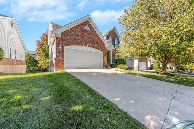 front of property featuring a garage, a front lawn, and central air condition unit