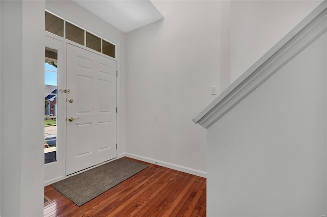 foyer entrance with dark wood-type flooring