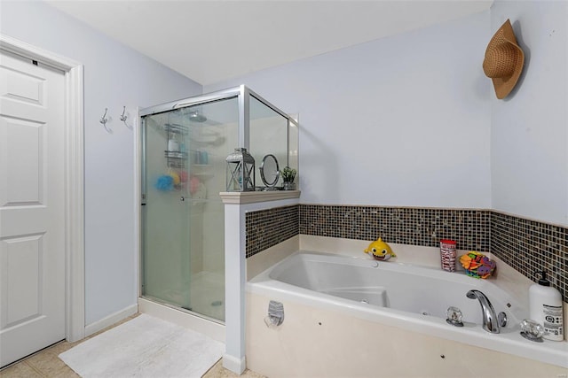 bathroom featuring tile patterned flooring and plus walk in shower