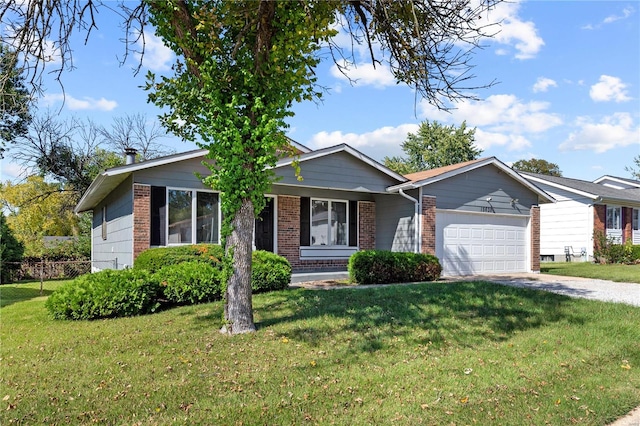 ranch-style house with a front yard and a garage