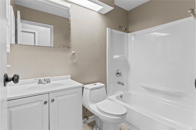 full bathroom featuring shower / washtub combination, vanity, and toilet