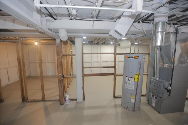 basement featuring heating unit and water heater