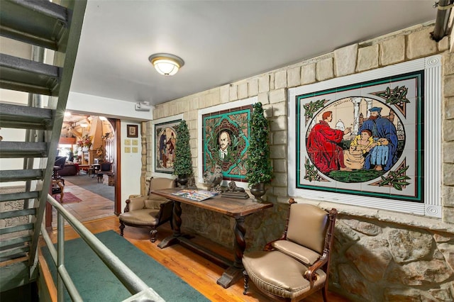 sitting room featuring hardwood / wood-style floors