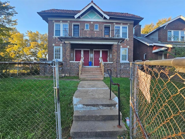 view of front of home featuring a front yard and a porch