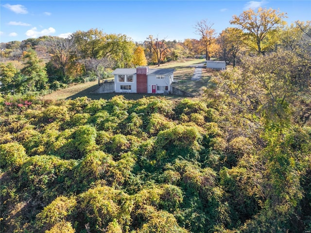 bird's eye view with a forest view