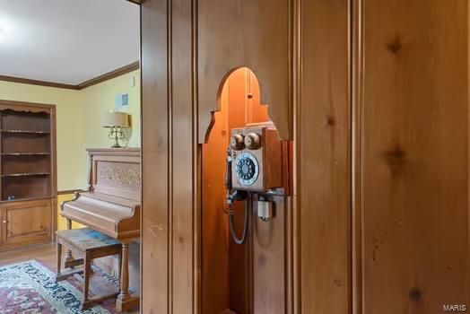 miscellaneous room featuring ornamental molding