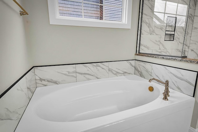 bathroom with a bathing tub