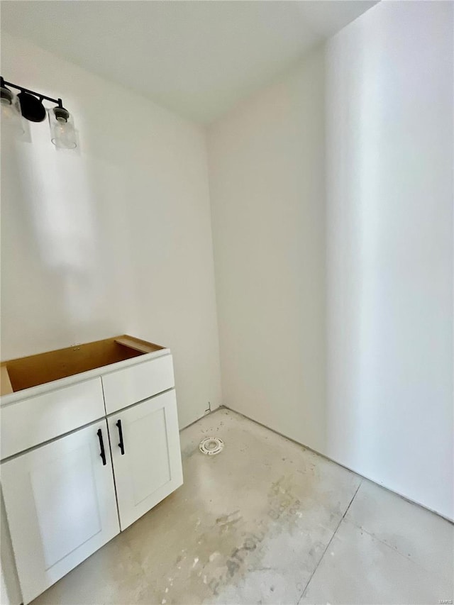 bathroom featuring concrete floors