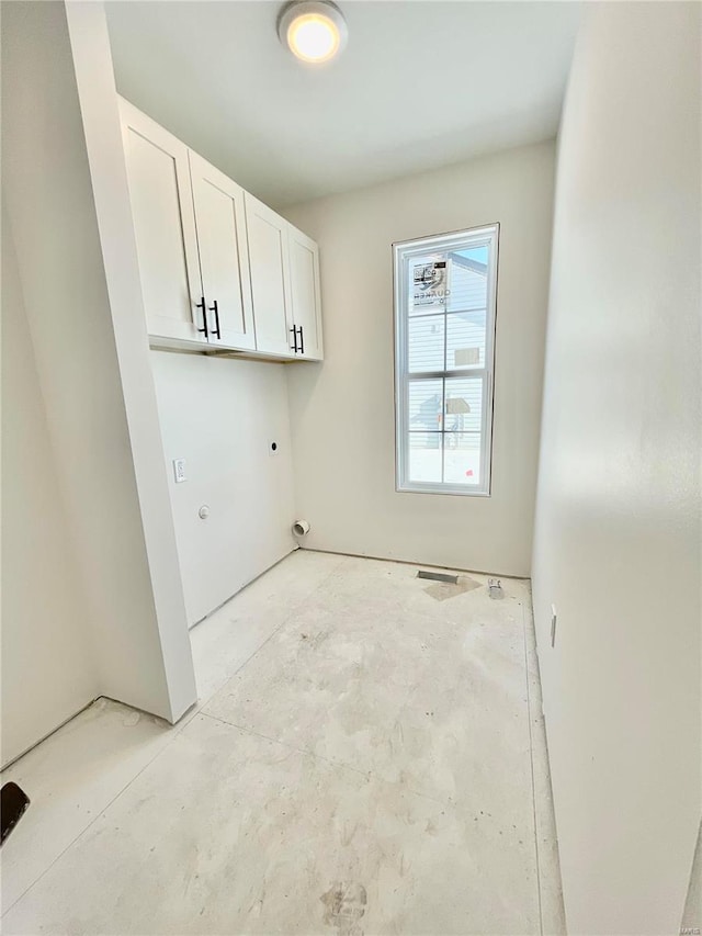 washroom featuring cabinets and hookup for an electric dryer