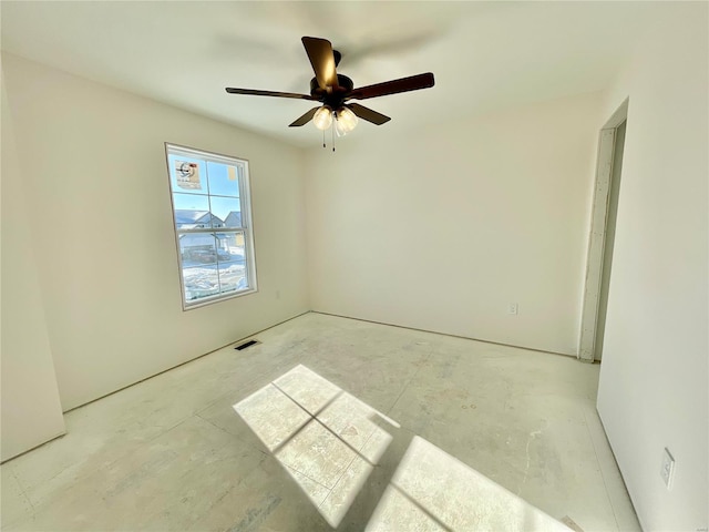 unfurnished room with ceiling fan