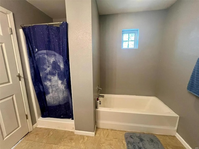 bathroom featuring plus walk in shower