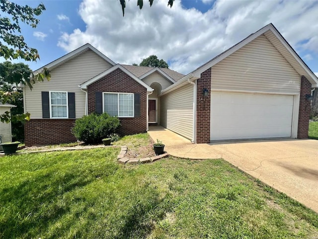 ranch-style home with a front lawn and a garage