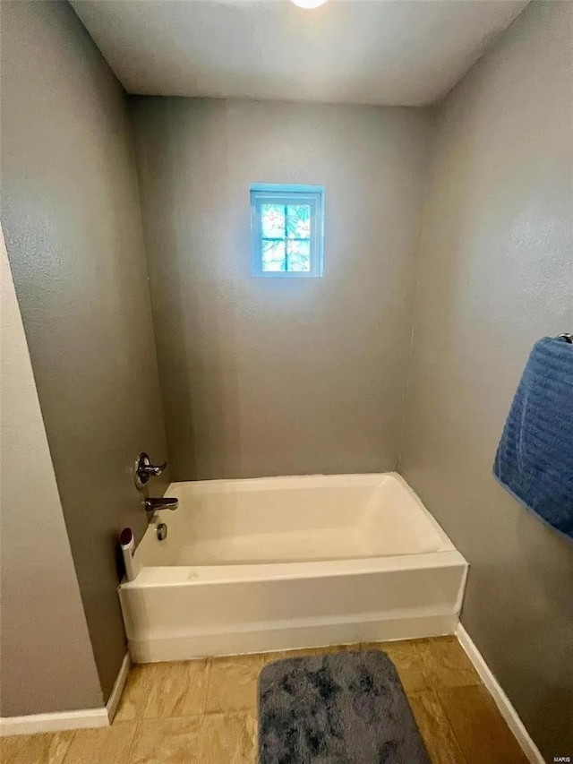 bathroom featuring a bath