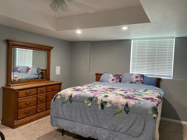 carpeted bedroom featuring ceiling fan