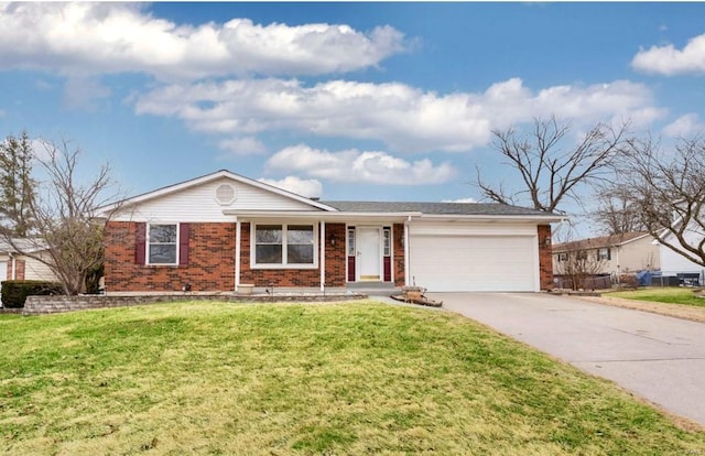 ranch-style home featuring a garage and a front yard