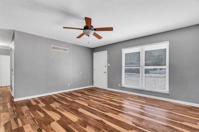 unfurnished room featuring ceiling fan and wood-type flooring