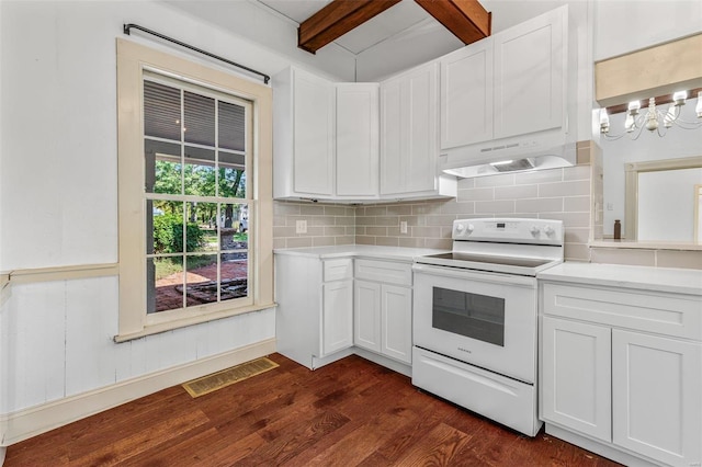 kitchen featuring beam ceiling, electric range oven, white cabinetry, and dark hardwood / wood-style flooring